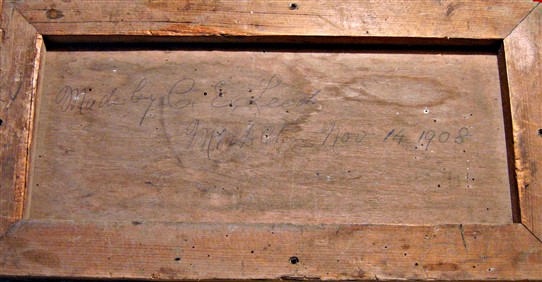 The wooden panel showing inscription